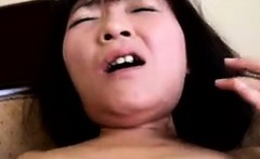 Busty Japanese lady has a guy deeply drilling her hairy pus