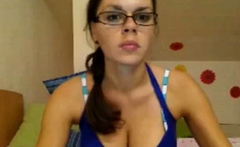 cute girl with glasses on webcam