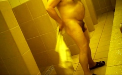Naked men in public pool shower