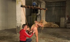 Bounded young sub enjoys a skillful handjob from his master
