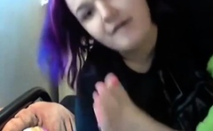 Goth emo girl licks her own feet